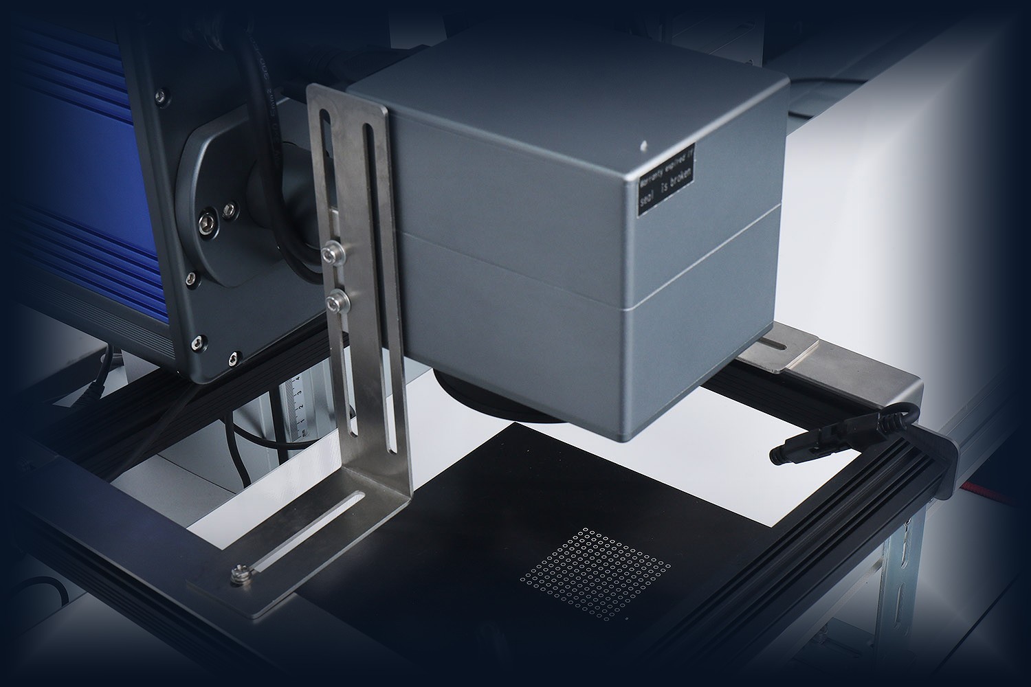 WDOTMARK fiber laser marking machine — precision marking head close-up